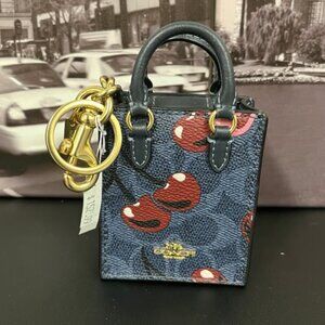 Coach Denim cherry bag charm